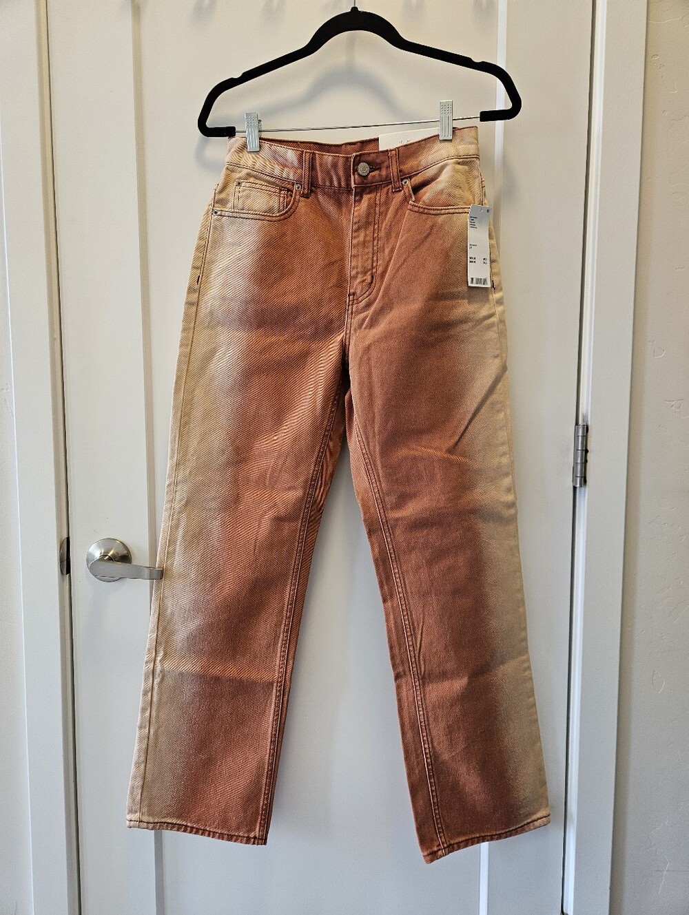 New BDG High-Waisted Cowboy Jeans in an orange ombré fade